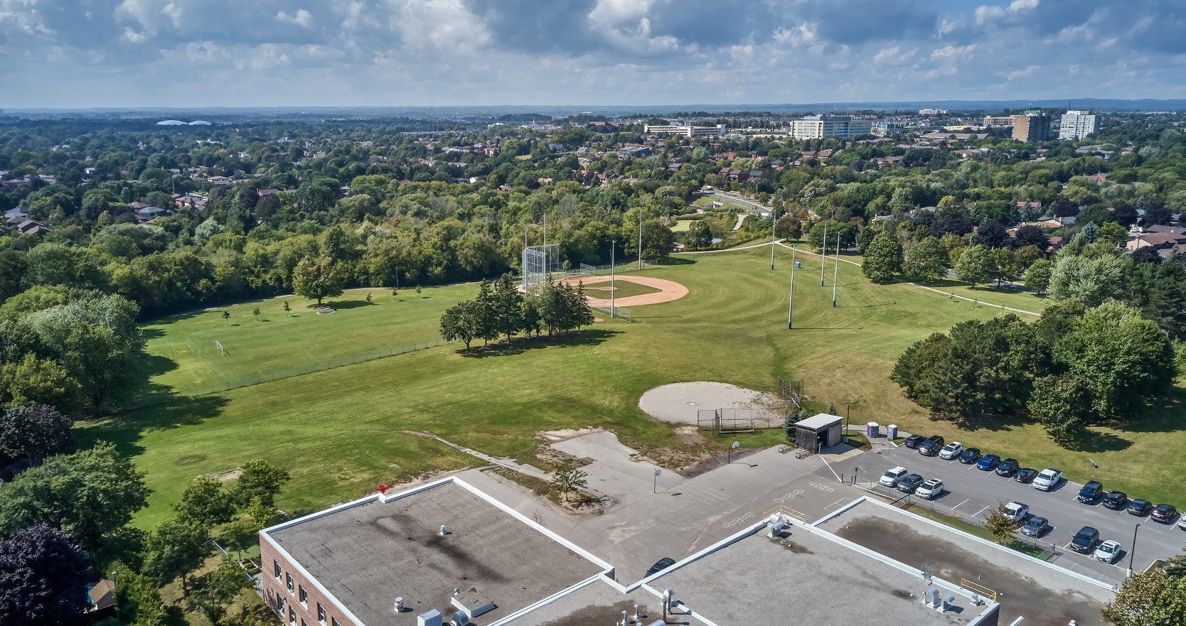View of a park from a condo building unit in Whitby, Ontario